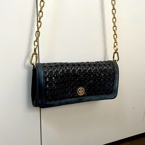 Cute Tory Burch clutch with long shoulder strap. Great for going out!